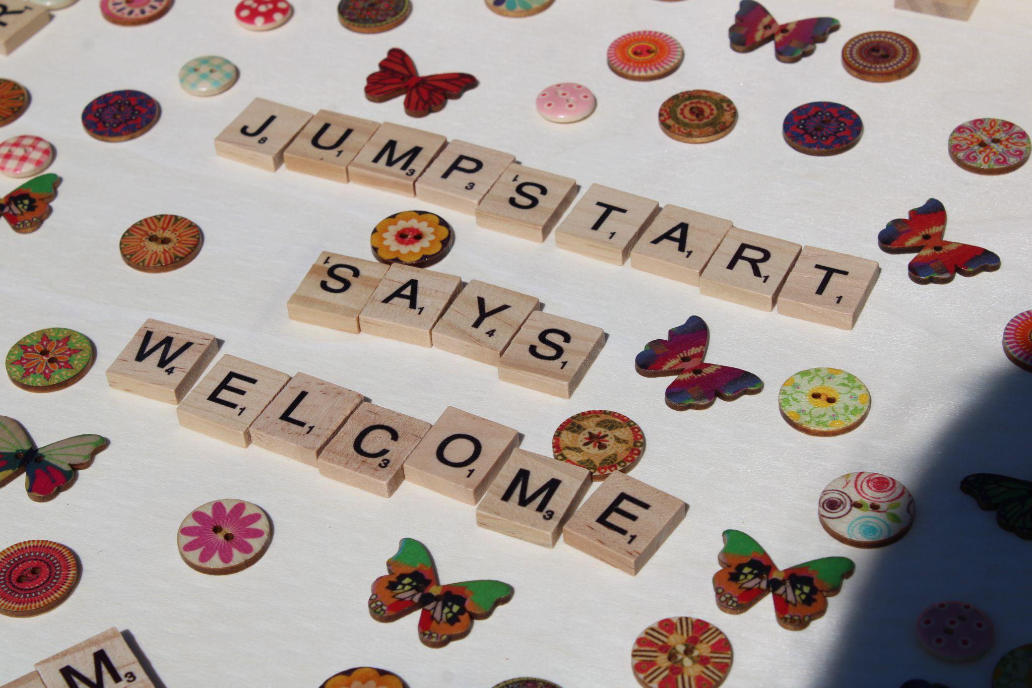 "Jumpstart says welcome" in scrabble letters